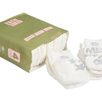 Open pack of Rebelalike bamboo diapers with printed diapers in front
